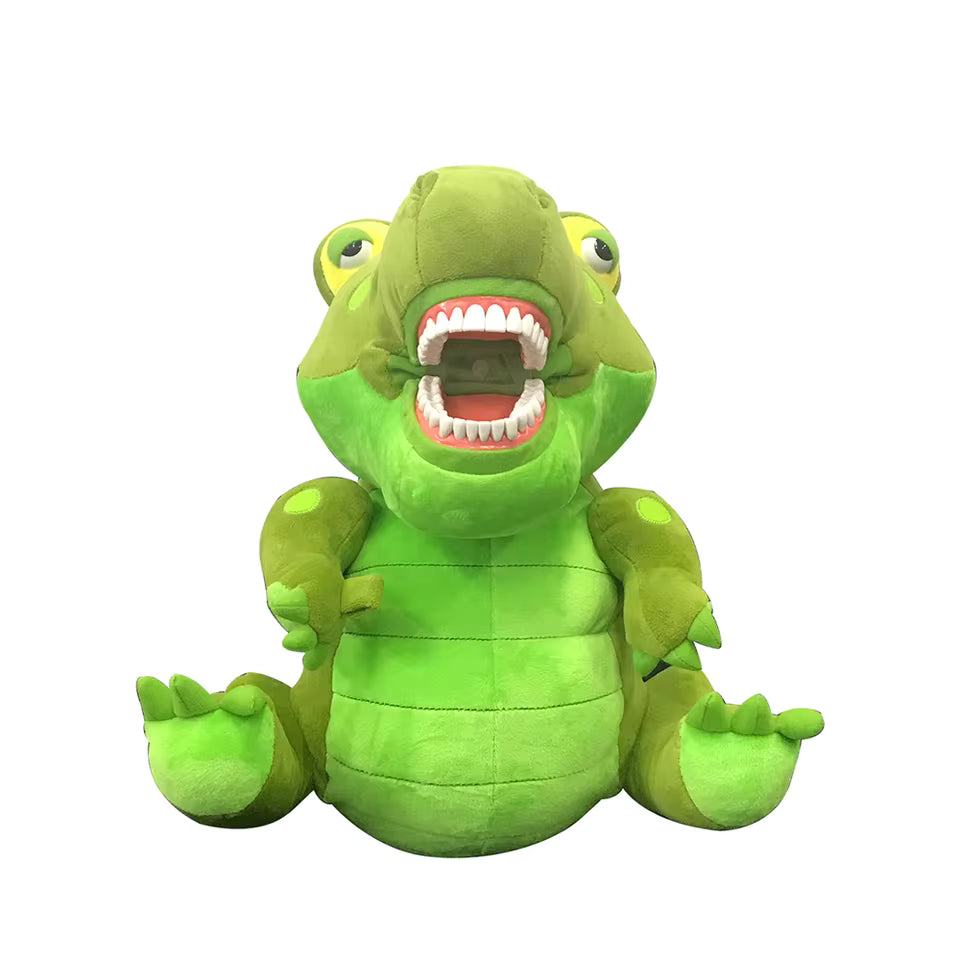 A green plush crocodile toy with an open mouth showing white teeth and pink tongue, set against a plain white background.