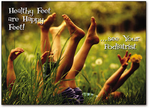 Feet up in long grass Postcard